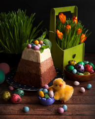 Traditional cottage cheese Easter Easter and eggs. Easter three chocolates. Easter dessert. Easter table. Cottage cheese dessert. Selective focus. - 499415968