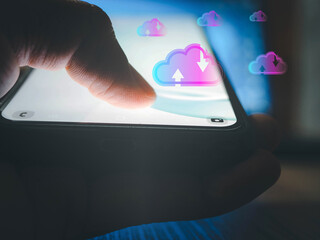 Man pressing the Smartphone screen to download a Cloud .connect to data base station and operations.