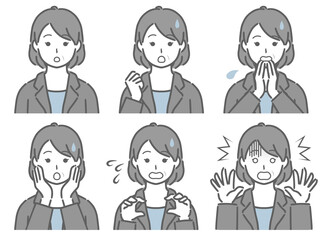 驚く表情の強弱　スーツの中年女性