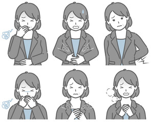 体調が悪いスーツの中年女性