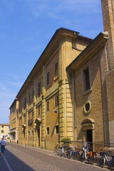Street with historical old buildings in downtown of Pesaro	