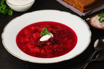 A plate with Ukrainian national dish - borsch