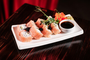 Sushi roll set with salmon and caviar