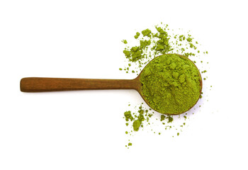 Traditional organic Japanese green tea powder in a wood spoon prepare match latte top view on white...