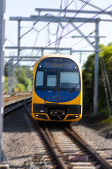 Naklejka premium Commuter train approaching a train station in Sydney NSW Australia
