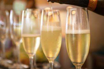 Glasses of champagne in a row.