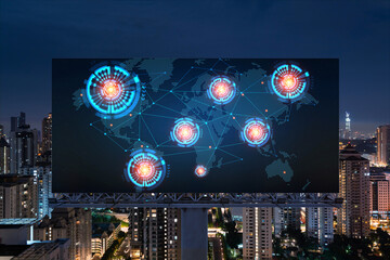 Hologram of Earth planet map on billboard over night panoramic cityscape of Kuala Lumpur, Malaysia, Asia. The concept of international companies in KL. Globe