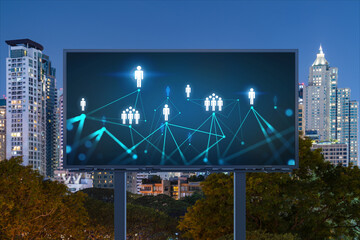 Glowing Social media icons on billboard over night panoramic city view of Bangkok. The concept of networking and establishing new connections between people and businesses in Southeast Asia