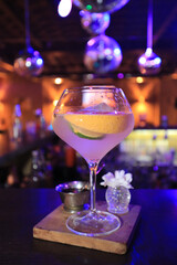 One alcoholic cocktail in a nightclub
