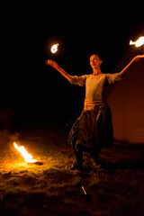 Fototapeta na wymiar woman with fire in her hands