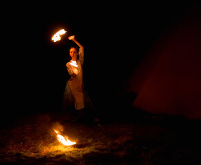 woman with fire in her hands - Powered by Adobe