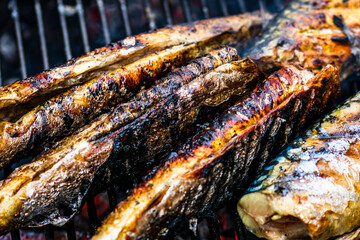 Grilled fish on charcoal grill. Fresh fish barbecue