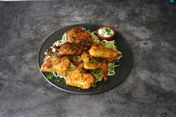 Assorted Indian dishes of rice and curry on wooden background