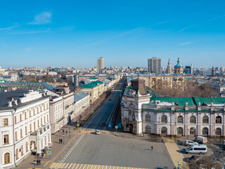 Magical view from the Spasskaya Tower of the Kazan Kremlin. View of the National Museum of the Republic of Tatarstan and Kazan City Hall on Kremlin Street