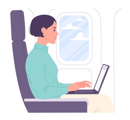 Fototapeta na wymiar Woman working on laptop in flight cabin