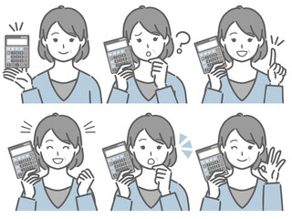 電卓を手に持つ中年女性