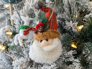 Santa Claus fur head on a Christmas tree