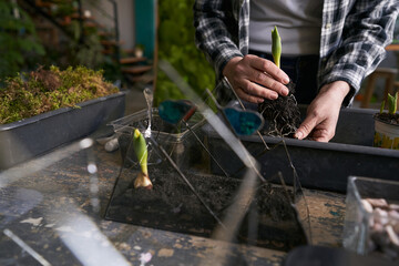 Close-up photo of woman working in workshop
