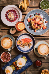 College of Breakfast Assortiment with pancakes, eggs, coffee 