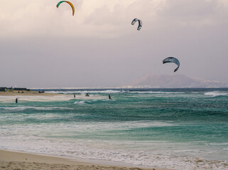 kitesurfers in a windy day at  Corralejo Dunes beach.Fuerteventura,Canary islands.