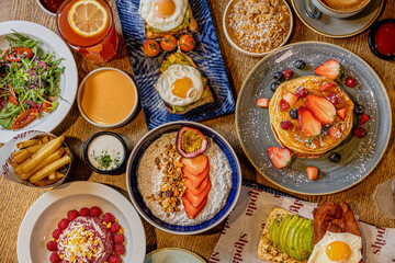 College of Breakfast Assortiment with pancakes, eggs, coffee 