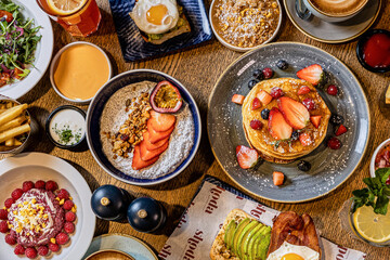 College of Breakfast Assortiment with pancakes, eggs, coffee 