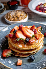 College of Breakfast Assortiment with pancakes, eggs, coffee 