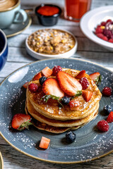 College of Breakfast Assortiment with pancakes, eggs, coffee 