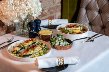 Set for two of seafood for dinner, Grilled shrimps or prawns served with lemon, garlic and sauce
