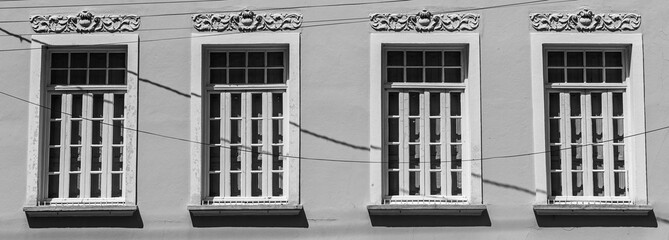 old wooden window on the facade of a house