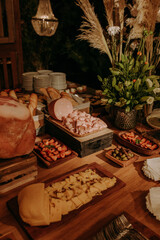 Close up of catering service table full of food. Concept of holiday event like wedding or anniversary. Restaurant self service and buffet with delicious