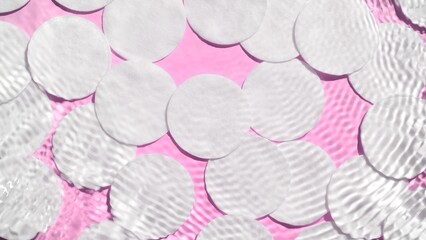 Top view shot of water waves and ripples crossing against cotton pads on pink background | beauty background, cleansing lotion commercial