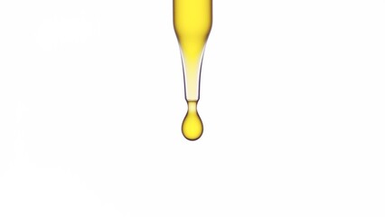 Macro shot of yellow drop is dripping from lab dropper against white background | Abstract skin...