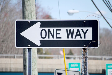 ONE WAY (arrow) Directional Street Sign Close-Up - obrazy, fototapety, plakaty