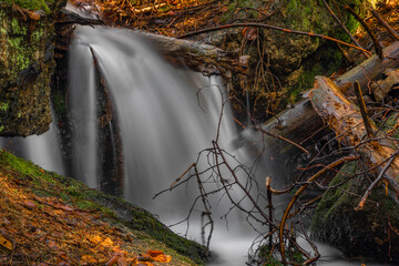 Cerveny creek with Cerveny waterfall in Jizerske mountains in spring morning