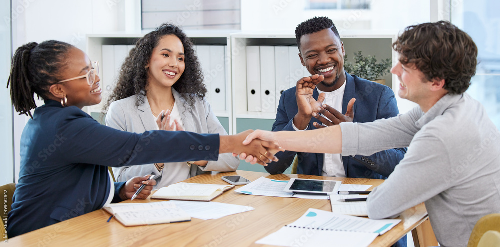 Poster concluding the meeting on a high note. shot of businesspeople shaking hands during a meeting in an o