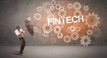 Obraz premium Businessman defending with umbrella concept