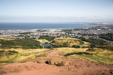 Fototapeta na wymiar Scotland, Edinburgh. Holyrood park and ancient volcano. Beautiful panoramic view City of Edinburgh from the mountain