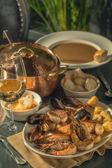 Fototapeta na wymiar Bouillabaisse Soup French Sea Food on wooden backround