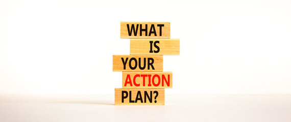 Action plan symbol. Concept words What is your action plan on wooden blocks. Beautiful white table white background. Business What is your action plan concept. Copy space.