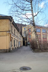 Old two-story yellow house in the city center
