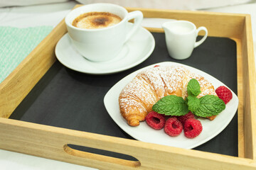 Fresh coffee in white cup, breakfast concept