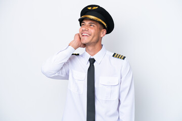 Airplane caucasian pilot isolated on white background thinking an idea