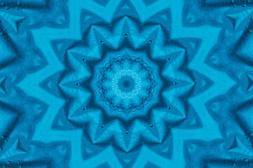 Blue wet paper abstract background. Kaleidoscope effect