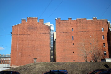 red brick wall of a building in the city