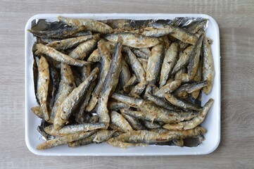Fried fish Euroropean sprat or sardine, a small and tasty fish caught in the Irish Sea, the Black Sea, the Baltic Sea and the Sea of the Hebrides.
