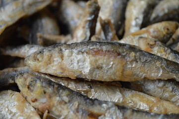 Fried fish Euroropean sprat or sardine, a small and tasty fish caught in the Irish Sea, the Black Sea, the Baltic Sea and the Sea of the Hebrides.