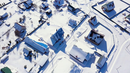 Beautiful winter village. Clip. A snowy area with small houses where it is very quiet.