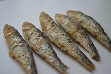 Fried fish Euroropean sprat or sardine, a small and tasty fish caught in the Irish Sea, the Black Sea, the Baltic Sea and the Sea of the Hebrides.