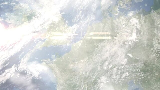 Earth zoom in from outer space to city. Zooming on Kortrijk, Belgium. The animation continues by zoom out through clouds and atmosphere into space. Images from NASA